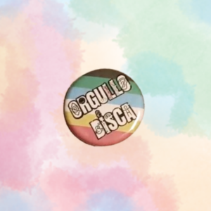 Chapa redonda «Orgullo Disca», con diseño multicolor de orgullo y diversidad.